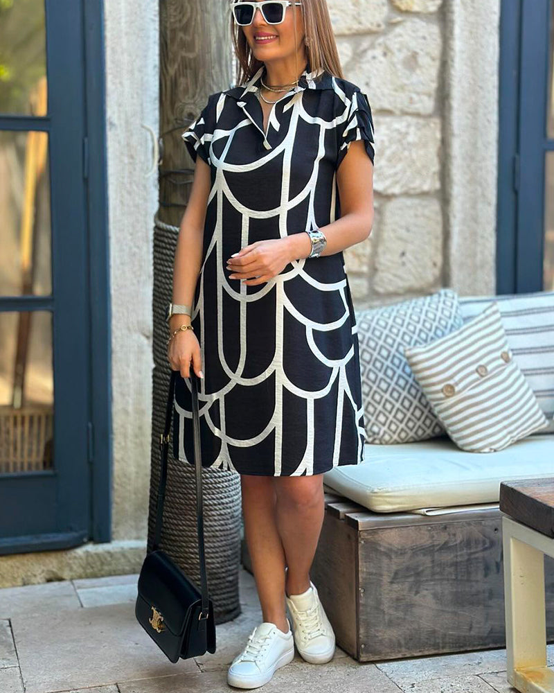 Sybilla – Elegancka midi sukienka z klapami i krótkimi rękawami